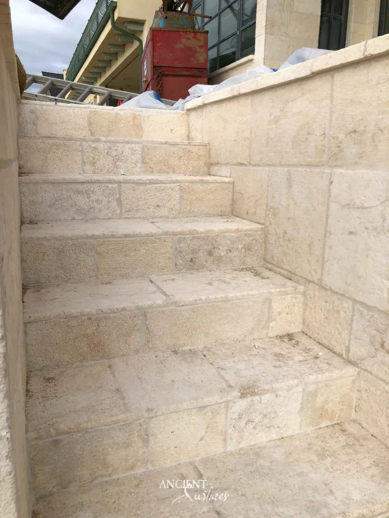 ancient-surfaces-kronos-stone-reclaimed-limestone-heritage-stone-architectural-surfaces-wall-cladding-limestone-flooring-stone-stairs-limestone-steps-old-world-materials-premium-stonework-antique-limestone-architectural-elements-luxury-stone-design